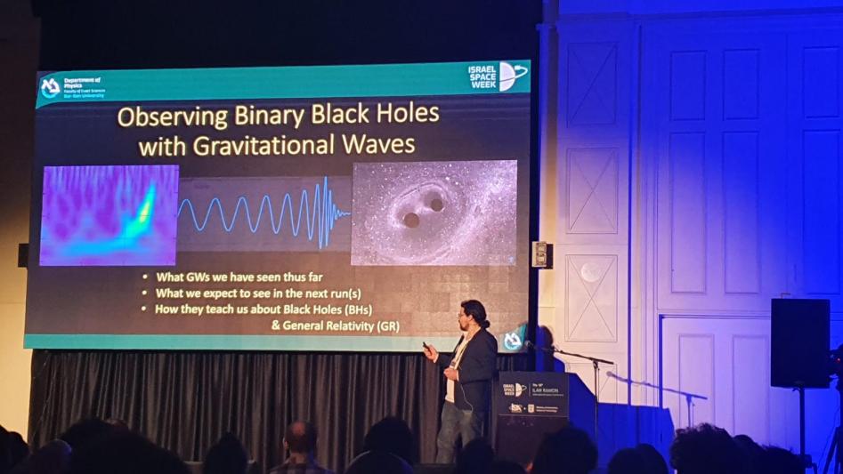 Dr Ofek Birnholtz giving a talk at the Israel Space Agency's Black Holes Conference